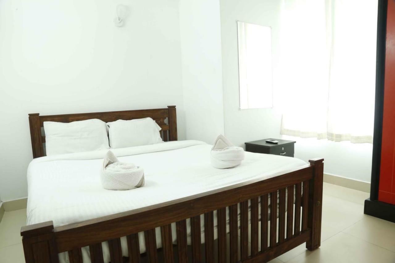 Traven Homes Infopark Kakkanad Corporate Suit Rooms Kochi Exterior photo